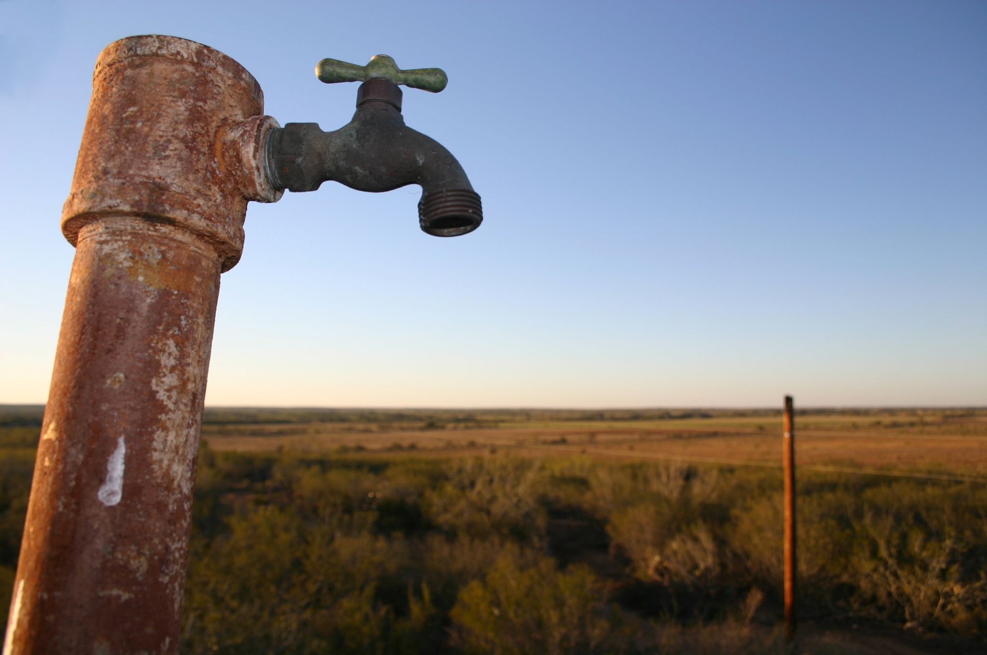 Rusty Texas Ranch Faucet at Sunset